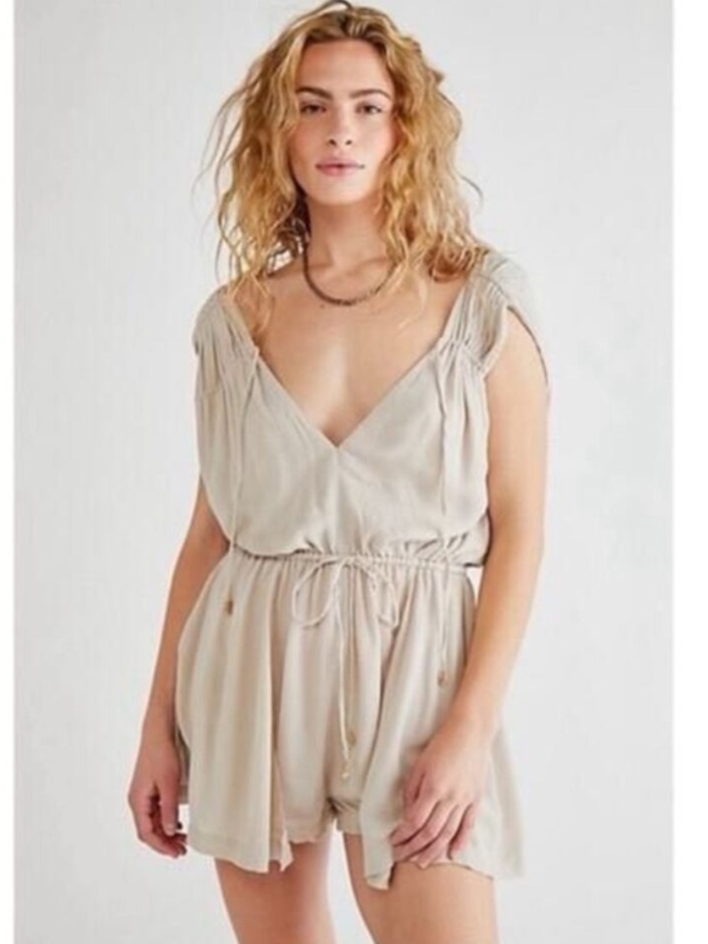 Free People Light taupe V-Neck Flowy Romper size small
